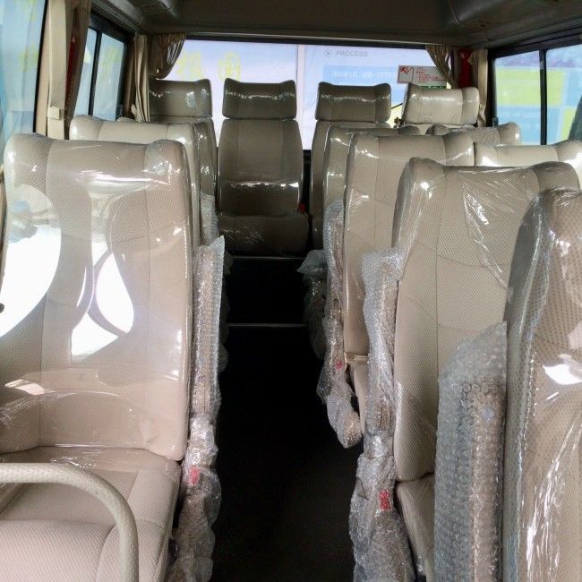 32-Sitzer Diesel-Coaster-Busse mit Klimaanlage und Traktionskontrolle für sicheren Personentransport